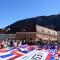 Scene from Halloween in Transylvania. showing students waving the international flag during the ESN Flag Parade.